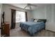 Bedroom with a queen-size bed and calming decor at 14840 N 21St St, Phoenix, AZ 85022