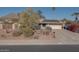 House exterior with a landscaped yard and solar panels at 14840 N 21St St, Phoenix, AZ 85022