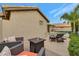 Relaxing backyard oasis with a fire pit and swimming pool at 14861 W Verde Ln, Goodyear, AZ 85395