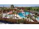 Resort-style pool with shade structures at 14861 W Verde Ln, Goodyear, AZ 85395