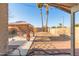 Backyard with patio, gazebo, and desert landscaping at 15268 W Melissa Ln, Surprise, AZ 85374