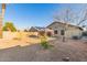 Backyard view of home with desert landscaping at 15268 W Melissa Ln, Surprise, AZ 85374