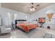 Large bedroom with a king-size bed and plenty of natural light at 15268 W Melissa Ln, Surprise, AZ 85374