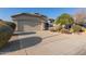 House exterior featuring a front yard with drought-tolerant landscaping at 15268 W Melissa Ln, Surprise, AZ 85374