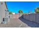 Backyard with gravel and double gates at 16351 W Yucatan Dr, Surprise, AZ 85388