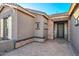 House exterior featuring a stone accent and a welcoming front entrance at 16351 W Yucatan Dr, Surprise, AZ 85388