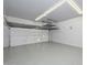 Spacious garage with overhead storage at 16351 W Yucatan Dr, Surprise, AZ 85388