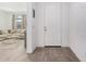 Bright entryway with tile flooring and view into living room at 17022 W Echo Ln, Waddell, AZ 85355