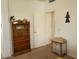 Bright bedroom with built-in shelves and an open door at 17449 N Fairway Dr, Surprise, AZ 85374