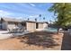 Spacious backyard with patio furniture and a view of the pool at 1865 W Keating Ave, Mesa, AZ 85202