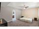 Primary bedroom with en-suite bathroom access and carpeted floor at 1865 W Keating Ave, Mesa, AZ 85202