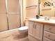 Bathroom with shower, toilet and vanity at 19002 N Signal Butte Cir, Sun City, AZ 85373