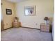 Bedroom with two nightstands and wall art at 19002 N Signal Butte Cir, Sun City, AZ 85373