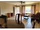 Living room with hardwood floors, a couch, and a coffee table at 19002 N Signal Butte Cir, Sun City, AZ 85373