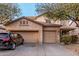 Charming two-story home with a three-car garage and well-maintained landscaping at 19308 W Jefferson St, Buckeye, AZ 85326