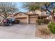 Charming two-story home with a three-car garage and well-maintained landscaping at 19308 W Jefferson St, Buckeye, AZ 85326