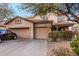 Charming two-story home with a three-car garage and well-maintained landscaping at 19308 W Jefferson St, Buckeye, AZ 85326