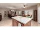 Kitchen island view with casual and formal dining areas visible at 19308 W Jefferson St, Buckeye, AZ 85326