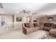 Large upstairs living room with carpet, ceiling fans, and a cozy sectional sofa at 19308 W Jefferson St, Buckeye, AZ 85326