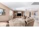 Upstairs living room with built-in shelving, carpet floors, and comfortable sofa at 19308 W Jefferson St, Buckeye, AZ 85326