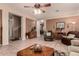 Open living room features tiled floors and neutral colored walls that offer a cozy living space at 19308 W Jefferson St, Buckeye, AZ 85326