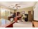 Well-lit home office with multiple workstations and organized shelving for storage at 19308 W Jefferson St, Buckeye, AZ 85326