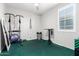 Dedicated home gym with various workout equipment at 19756 W Roma Ave, Litchfield Park, AZ 85340