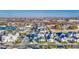 Aerial view of a community of luxury homes with a lake and mountain views at 20628 E Natalie Way, Queen Creek, AZ 85142