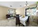 Dining area with a table and leather sofa at 2212 E Sunland Ave, Phoenix, AZ 85040