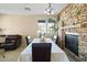 Dining area with a stone fireplace at 2212 E Sunland Ave, Phoenix, AZ 85040