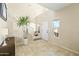 Bright and airy entryway with tile flooring and staircase at 2212 E Sunland Ave, Phoenix, AZ 85040