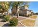 Two-story house with landscaping and a walkway at 2212 E Sunland Ave, Phoenix, AZ 85040