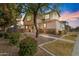 Two-story house with landscaping at sunset at 2212 E Sunland Ave, Phoenix, AZ 85040