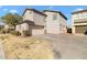 Two-car garage and driveway at 2212 E Sunland Ave, Phoenix, AZ 85040