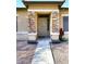 Front entry with stonework and a security door at 234 N Seymour --, Mesa, AZ 85207