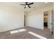 Bright bedroom with carpet flooring and ceiling fan at 2383 E Cana Ln, Casa Grande, AZ 85194