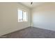 Simple bedroom with carpet and window at 2383 E Cana Ln, Casa Grande, AZ 85194