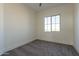 Bright bedroom with carpet and window at 2383 E Cana Ln, Casa Grande, AZ 85194