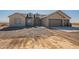 New construction home with two-car garage and desert landscaping at 2383 E Cana Ln, Casa Grande, AZ 85194