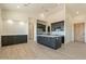 Modern kitchen with dark cabinetry and white subway tile at 2383 E Cana Ln, Casa Grande, AZ 85194