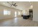 Open concept kitchen with island and stainless steel appliances at 2383 E Cana Ln, Casa Grande, AZ 85194