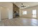 Spacious living room with stone fireplace and high ceilings at 2383 E Cana Ln, Casa Grande, AZ 85194