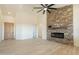 Living room with stone fireplace and high ceilings at 2383 E Cana Ln, Casa Grande, AZ 85194