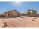 Large backyard with gravel and fire pit at 25360 W Fremont Ct, Buckeye, AZ 85326