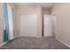 Well-lit bedroom with double door closet at 25360 W Fremont Ct, Buckeye, AZ 85326