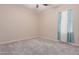 Spacious bedroom with carpet and a window at 25360 W Fremont Ct, Buckeye, AZ 85326