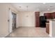 Bright dining area with sliding glass doors leading to patio at 25360 W Fremont Ct, Buckeye, AZ 85326