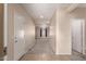 Bright entryway with tile flooring, carpet, and doors to other rooms at 25360 W Fremont Ct, Buckeye, AZ 85326