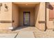 House entrance with a decorative door and small porch at 25360 W Fremont Ct, Buckeye, AZ 85326