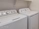 Laundry room with washer and dryer at 25360 W Fremont Ct, Buckeye, AZ 85326